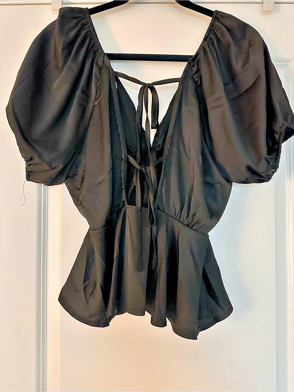 Always Entertaining Black Puff Sleeve Tie-Back Peplum Top